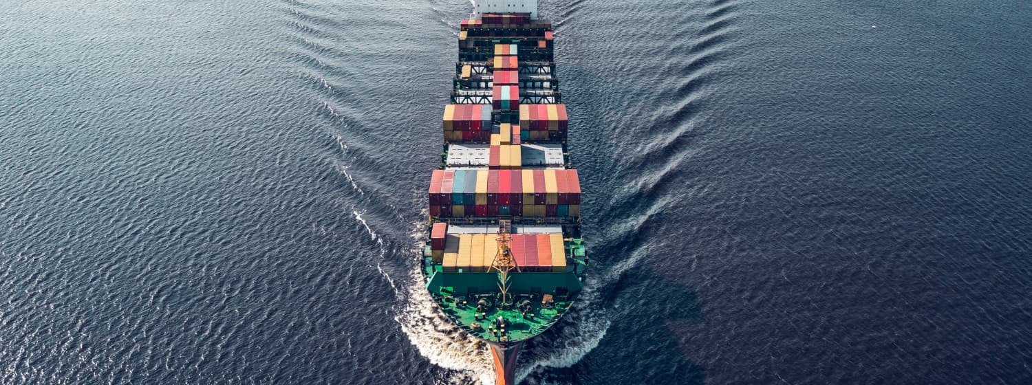 Boat floating in the center of the sea